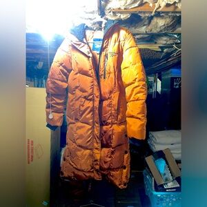 NWOT rust/orange colored Reebok full length winter coat